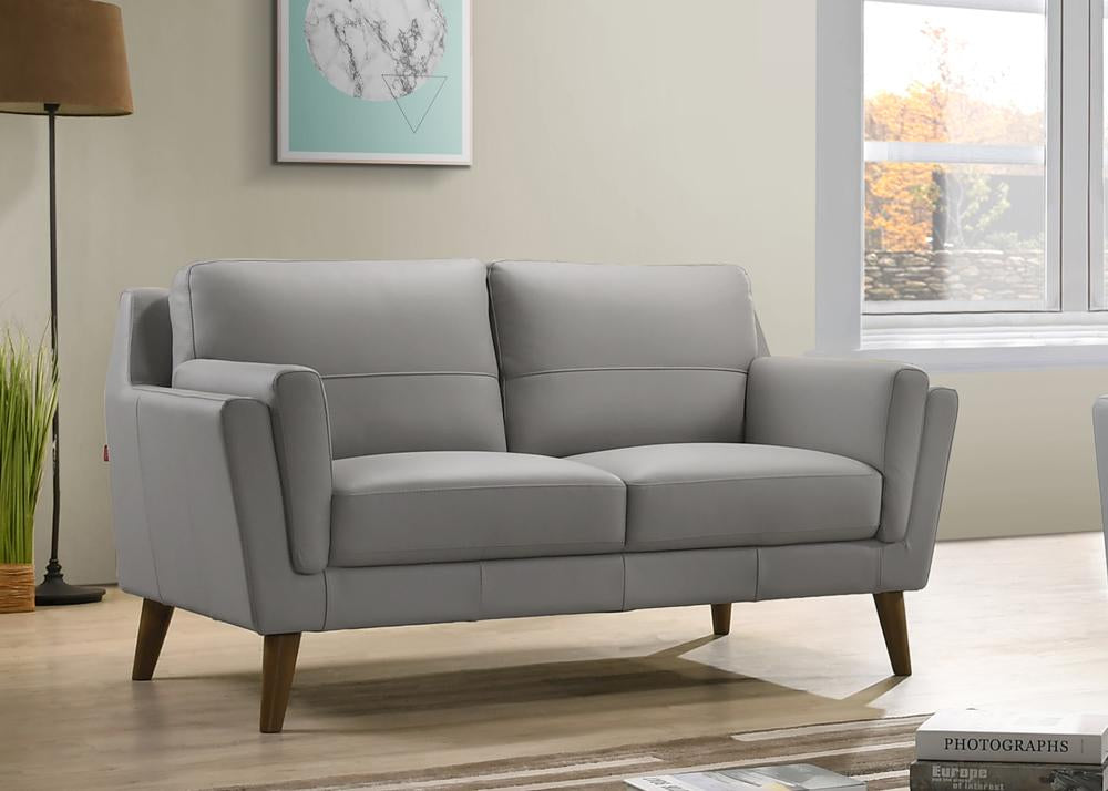  Love seat in  Leather Match PU with  Solid wood frame & legs,  Inner spring seat cushion. Grey in color. Measures at 60” x 34.25” x 33.5”H.